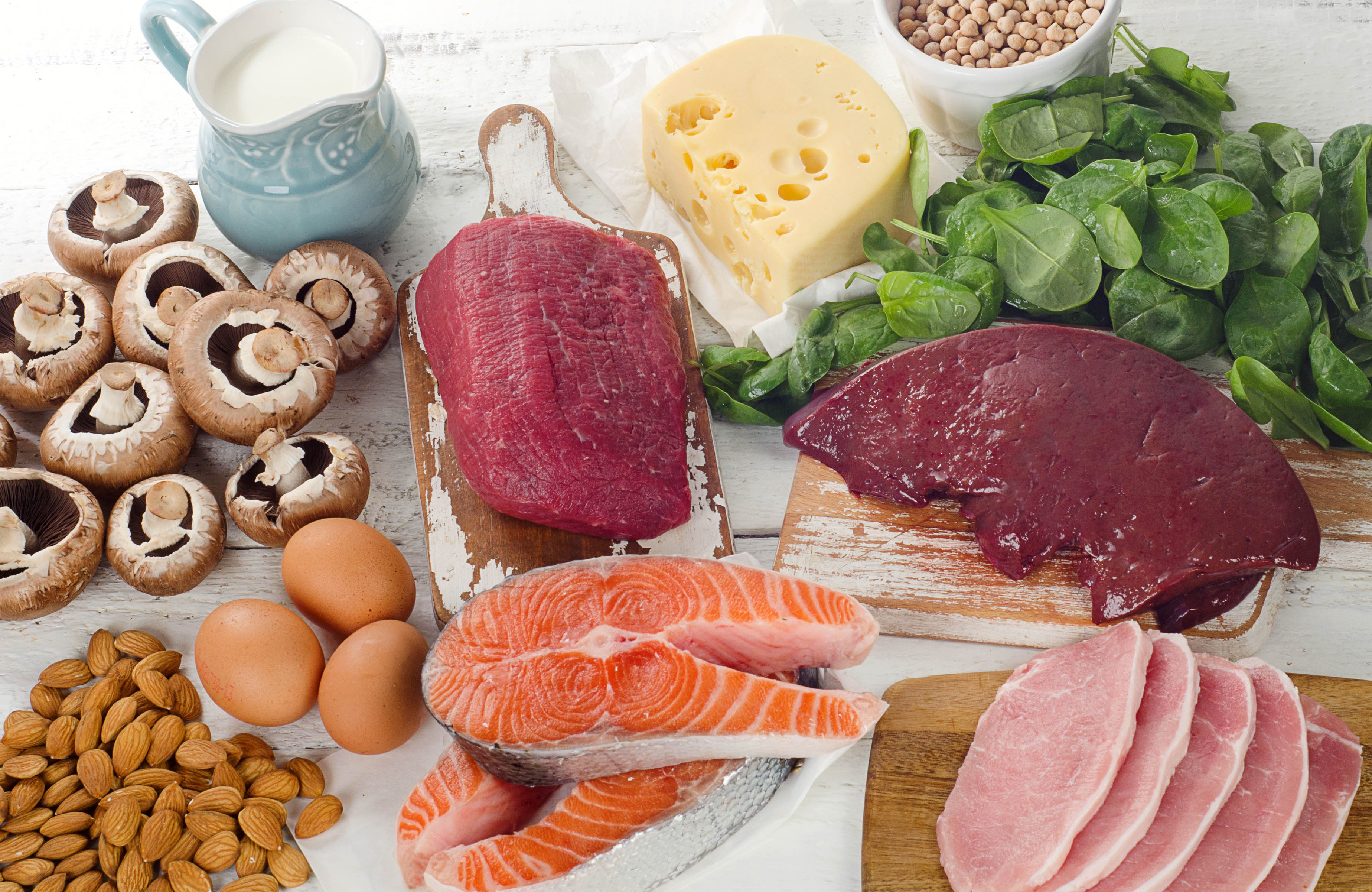 Foods that are high in vitamin B12 - including mushrooms, milk, beef liver, eggs, almonds, salmon, pork chops, spinach, cheese